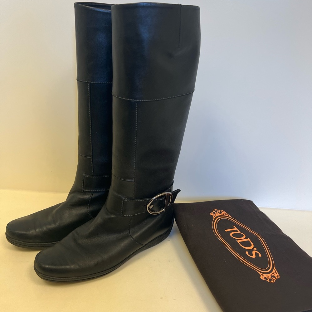 Elegant black leather knee high Tod’s boots